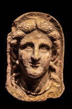 Female votive head, 3rd - 2nd century, a.C., Archaeological Museum, Castello di Udine, seat of the