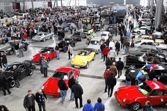 RETRO CLASSICS 2010, Stuttgart Messe, A large hall with many classic cars and visitors at a motor