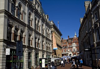 Market stalls and town centre buildings, Lloyds Avenue, Ipswich, Suffolk, England, United Kingdom,