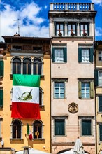 Piazza San Giacomom with Alpini flag, Udine, most important historical city of Friuli, Italy,