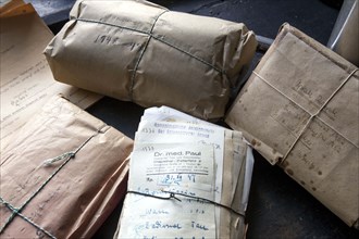 Old prescriptions from 1948 lie on a worktable in the former laboratory of the historic