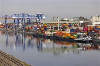 Container terminal in the port of Mannheim, sea containers are stacked in one of the most important