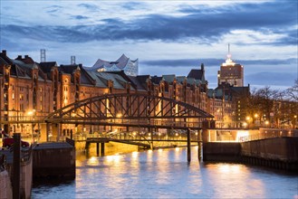 Speicherstadt Hamburg and Elbe Philharmonic Hall with customs canal at the blue hour, Hamburg,