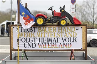 A demonstration sign mounted on a car trailer taken as part of the 'AeoeFarmers' protests'Aeo in