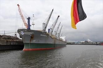 Cargo ship in the grey harbour, Hamburg, Hanseatic City of Hamburg, Germany, Europe