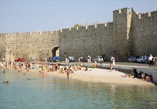 Beach and old town walls, Rhodes town, Greece, Europe