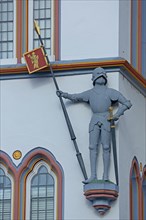 Knight with armour, lance, helmet and sword at the historic house Steipe built in 1430, figure,