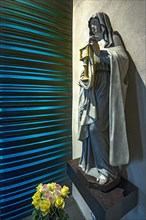 Sculpture by Caritas Pirckheimer at the entrance to St Mary's Chapel, St Clare's Church,