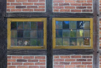 Colourful window panes of a 19th century smithy, Open-Air Museum of Folklore Schwerin-Muess,