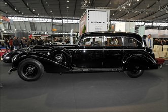 RETRO CLASSICS 2010, Stuttgart Messe, The side view of an elegant black classic car saloon with