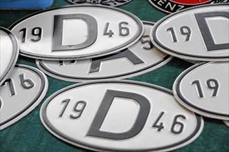 RETRO CLASSICS 2010, Stuttgart Trade Fair, Collection of round, silver-coloured vehicle badges with