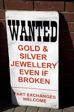 Sign offering to buy unwanted or broken gold, silver jewellery, England, UK