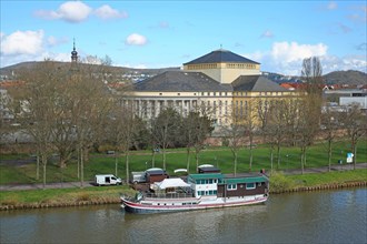 View over the Saar with ship to the State Theatre, Saarufer, Saarbruecken, Saarland, Germany,