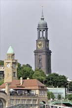 The Hamburg Michel with its striking tower clock under a cloudy sky, Hamburg, Hanseatic City of