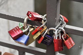 Love locks of young lovers at the Niederbaumbruecke, Speicherstadt, Hamburg harbour, Different