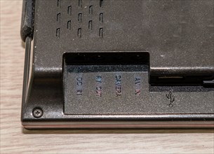 Back of automobile navigation system showing the various IO ports and sd card slot