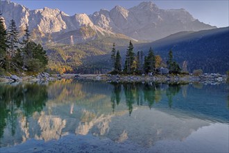 Mountain lake in front of steep mountains, reflection, evening light, autumn, Eibsee lake, view of