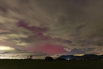 Red northern lights over Upper Bavaria, Aurora borealis, Loisach-Lake Kochel moor, Bavaria,