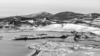 Crater lakes in volcanic landscape, onset of winter, black and white image, Fjallabak Nature