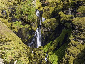 Waterfall in the rocks, near Vik, Sudurland, Iceland, Europe