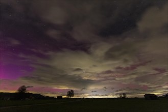 Red and violet northern lights over Upper Bavaria, Aurora borealis, Loisach-Lake Kochel moor,