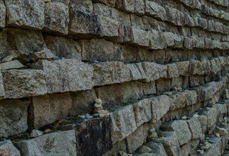 Perspective view of mountain fortress wall made of flat stones in Boeun, South Korea, Asia