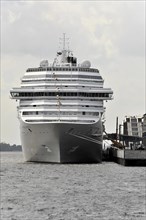 COSTA PACIFICA, Docked cruise ship on the waterfront under dark clouds, Hamburg, Hanseatic City of