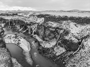 Hrauneyjarfoss waterfalls, drone image, black and white image, Sudurland, Iceland, Europe