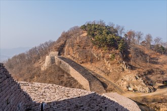 Section of mountain fortress wall made of flat stones located in Boeun South Korea