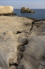 WWhite rocks on the coast near Sarakinikoer, Milos, Cyclades, Greece, Europe