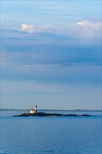 Lighthouse over FjordSailing, Stavanger, Boknafjorden, Norway, Europe