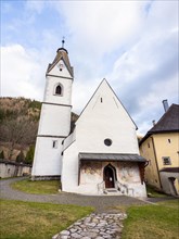Parish church Tragoess-Oberort, dedicated to St Magdalena, fortified church in Romanesque style,