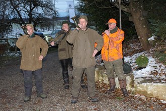 Wild boar (Sus scrofa) end of hunt, hunting horn blowers blow signal sow dead, tradition, Allgaeu,