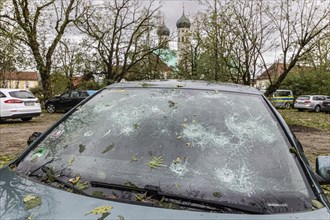Windscreen of a car destroyed by hail, severe weather, climate change, Benediktbeuern Monastery,
