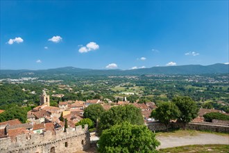 View from Grimaud Castle over the village of Grimaud, in the background the hills of the Massif des