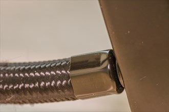 Close-up of a chrome bike handlebar end showing a reflective surface, in South Korea
