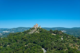 Landscape with the castle of Grimaud, in the background the hills of the Massif des Maures,