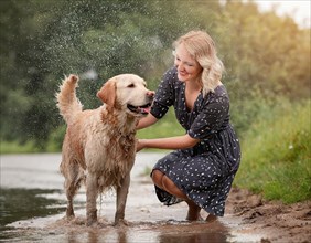 Labrador dog dirty muddy wet, shaking next to a woman in a dark summer dress, AI generated, AI