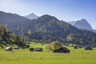 Hay barn with meadow, Alpspitze and Wetterstein mountains, Garmisch-Partenkirchen, Werdenfelser