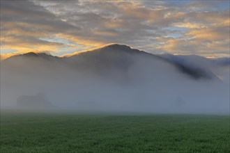 Morning atmosphere with clouds over mountains, fog, spring, Loisach-Lake Kochel-Moor, Bavaria,