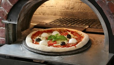 Food, pizza in front of the pizza oven, AI generated, AI generated