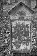 Jewish cemetery, weathered gravestone, black and white, wine village Beilstein, Moselle,