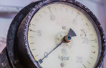 Closeup of old pressure gauge with blurred white background in Gangneung, South Korea, Asia