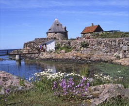 Bathplace, stonewalls and tower at the old Christiansoe Fortress, Bornholm, Denmark, Baltic Sea,