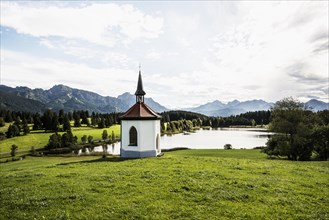 Hegratsrieder See with chapel, near Fuessen, Ostallgaeu, Allgaeu, Bavaria, Germany, Europe