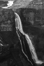 Foaming Halfoss waterfall, black and white photo, Sudurland, Iceland, Europe