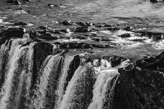 Pjofafoss waterfall, black and white photo, Sudurland, Iceland, Europe