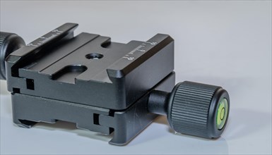 Closeup of lock type camera mount for use on tripod
