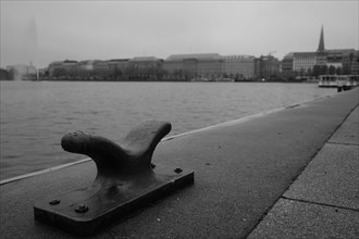 Roller for ship fortification, Inner Alster Lake behind, blurred background, black and white,