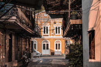 Deserted alleyway among the vintage house in Yaowarat Road or Chinatown in Bangkok Thailand